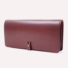 Casanova - Pochette en veau barenia chocolat et chèvre rouge vif